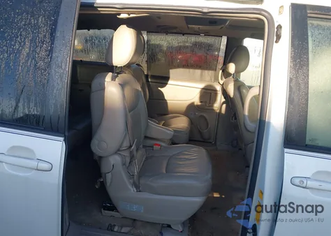 2009 Toyota Sienna Xle z USA, uszkodzony, nr VIN 5TDZK22C09S255844